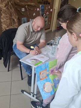 Obrazy news&oacute;w: spotkanie_z_autorem_11.jpg